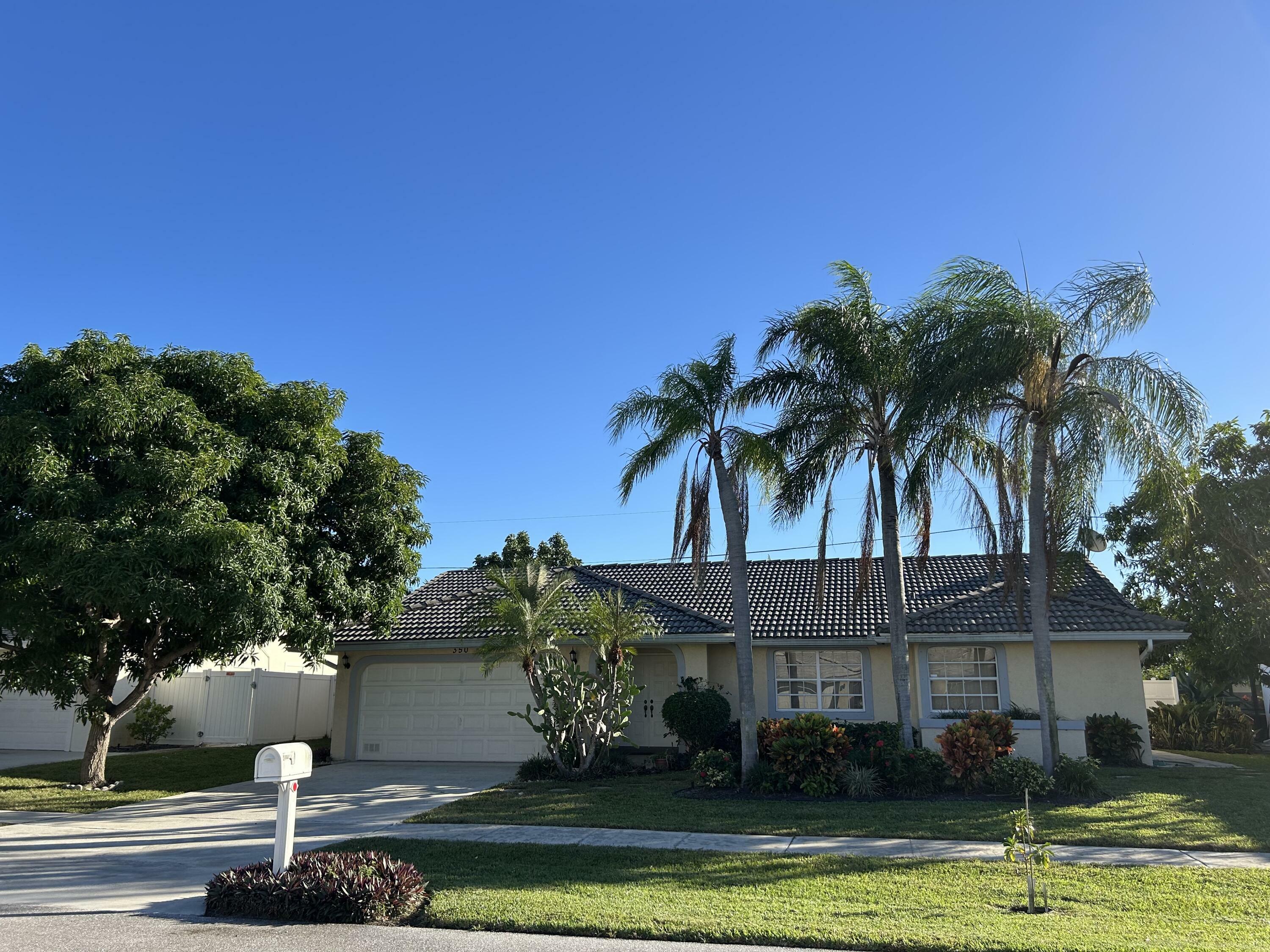 Property Photo:  350 Apache Lane  FL 33487 