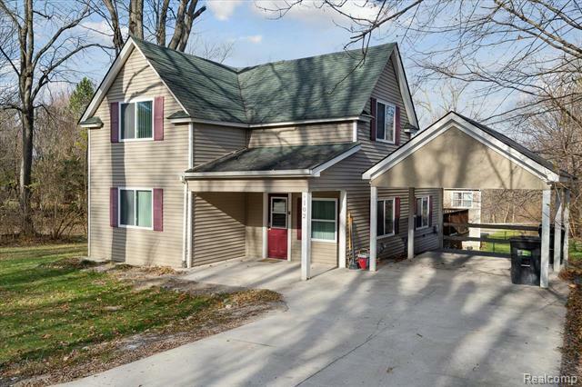 Property Photo:  102 Cloverport Avenue  MI 48307 