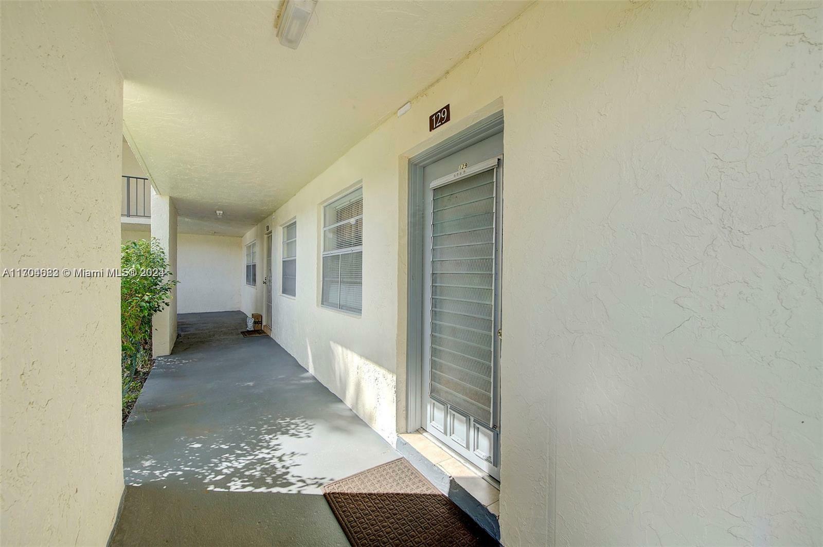 Property Photo:  3000 NW 48th Ter 129  FL 33313 