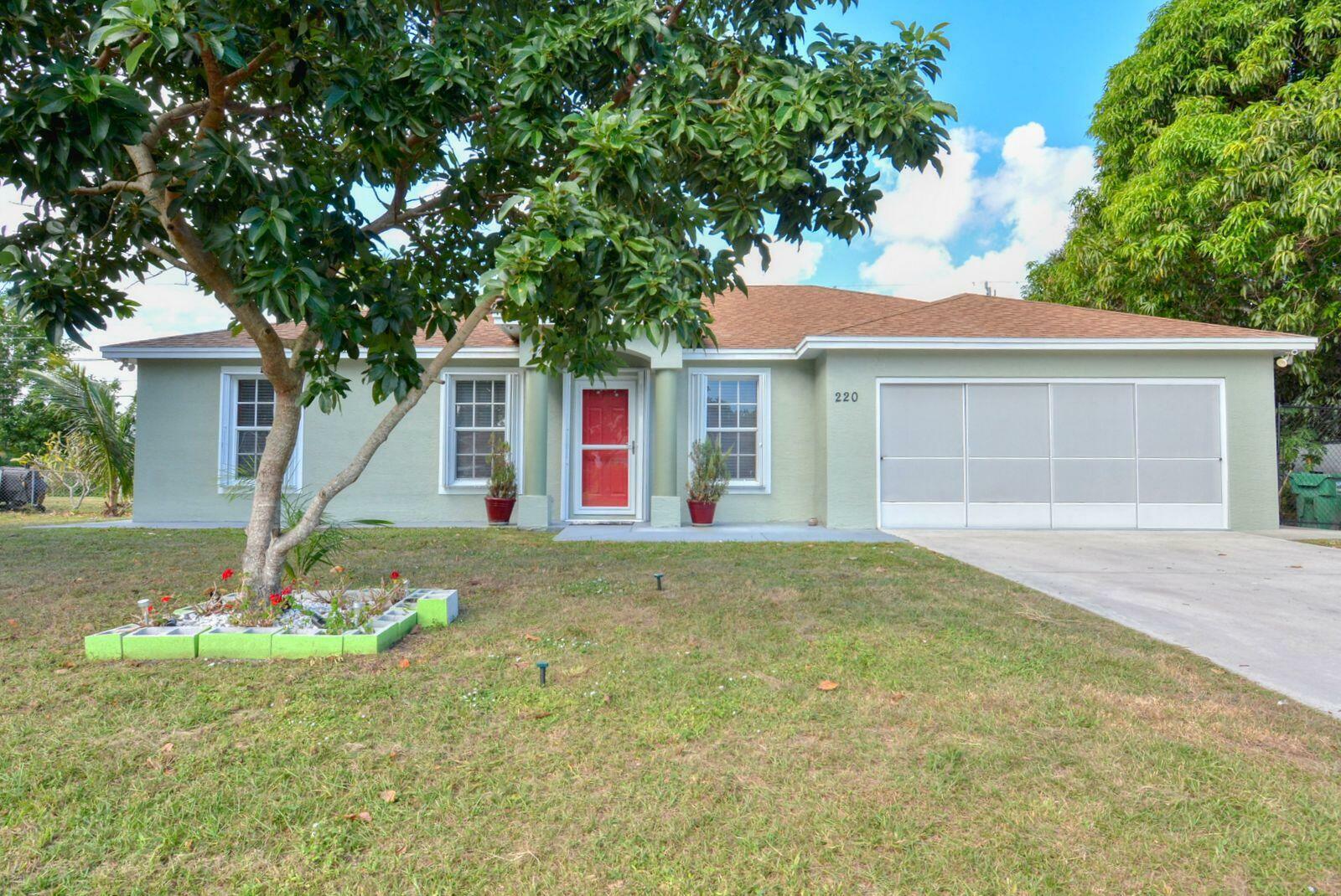 Property Photo:  220 W Arbor Avenue  FL 34952 