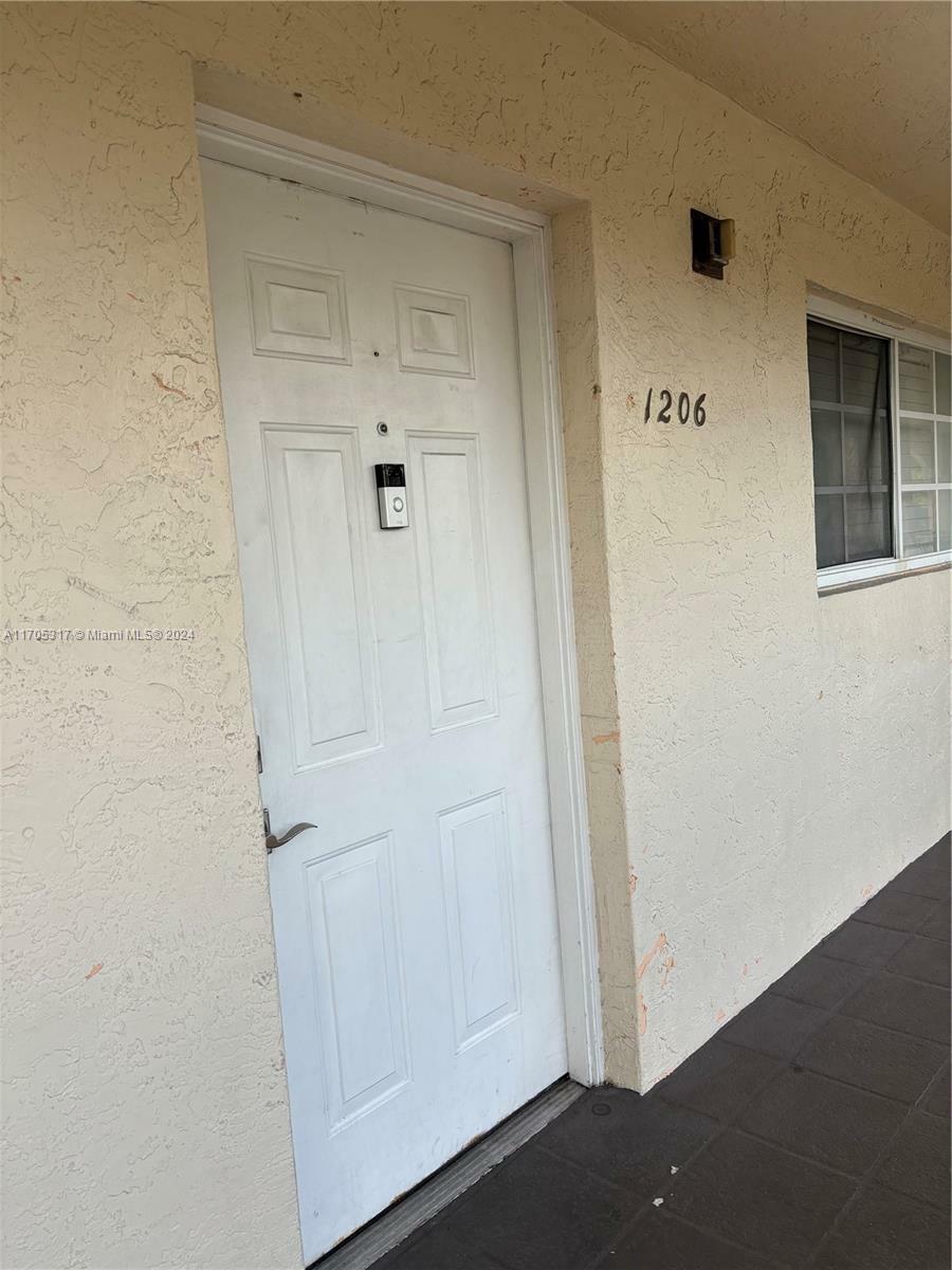 Property Photo:  8851 NW 119th St 1206-1  FL 33018 