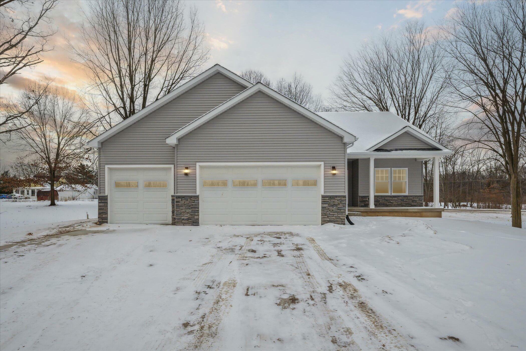 Property Photo:  10025 Stoll Road  MI 48840 