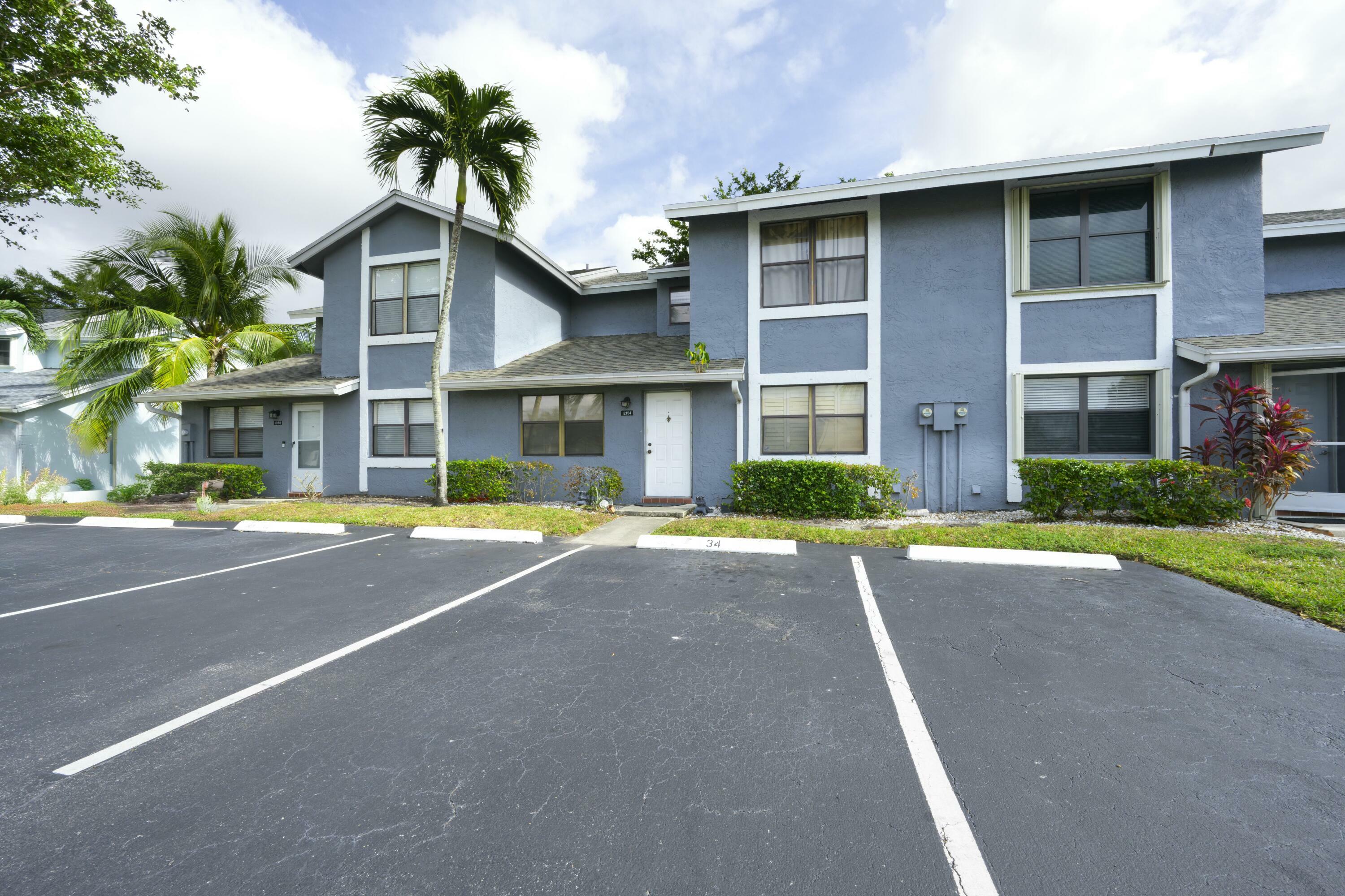Property Photo: 12154 Pasadena Way FL 33437