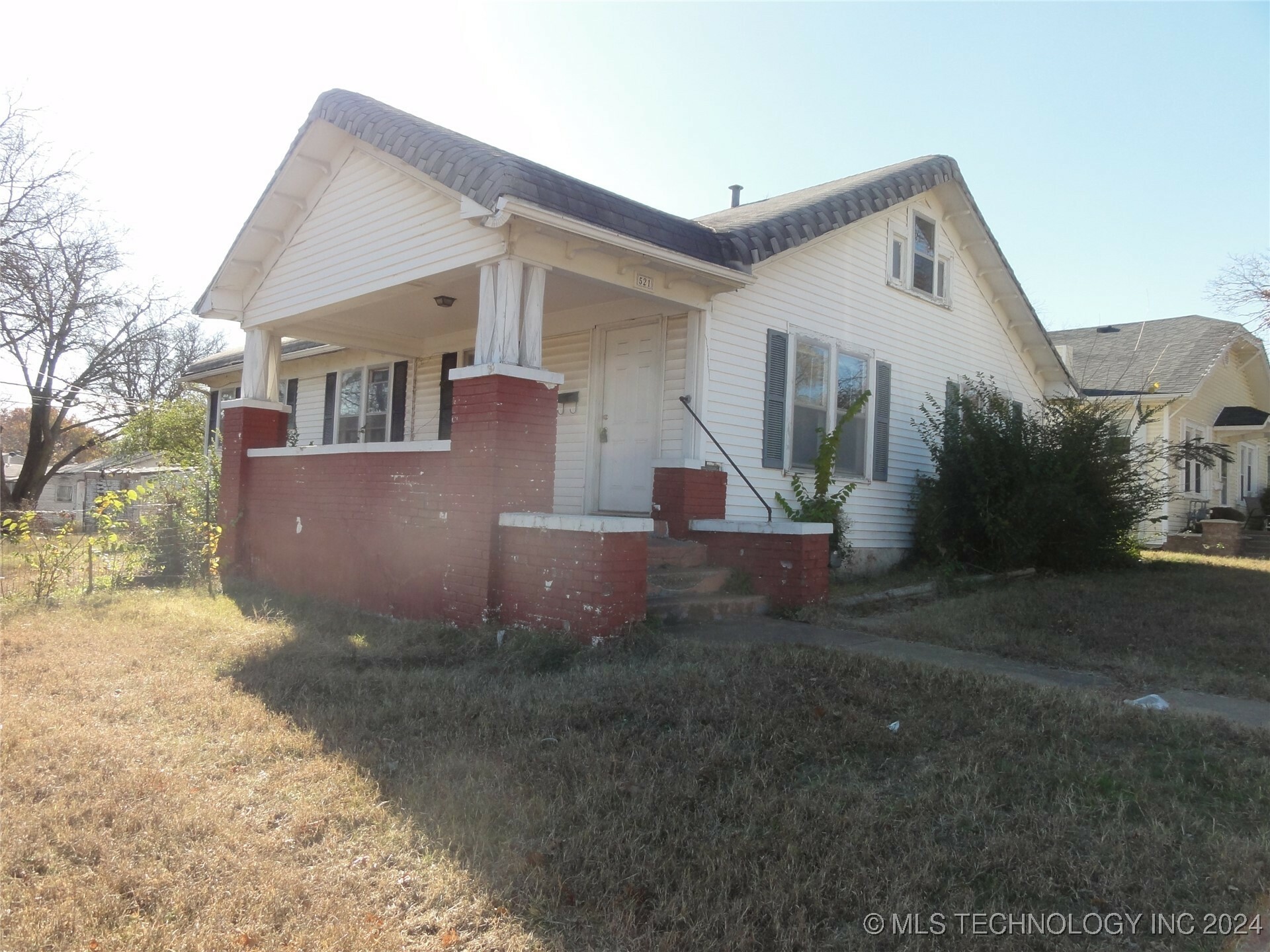 Property Photo:  521 E 11th  OK 74003 