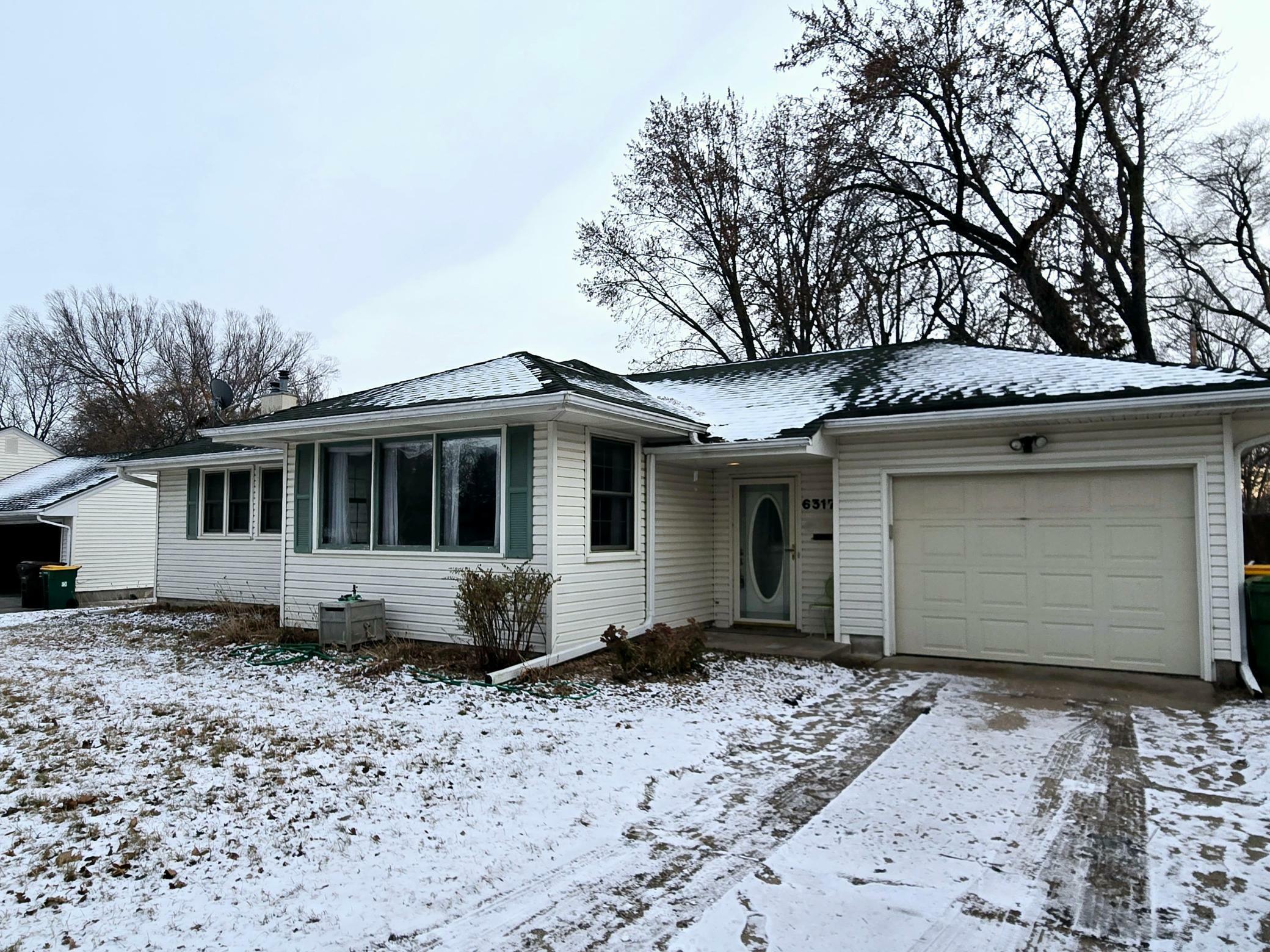 Property Photo:  6317 45th Avenue N  MN 55428 