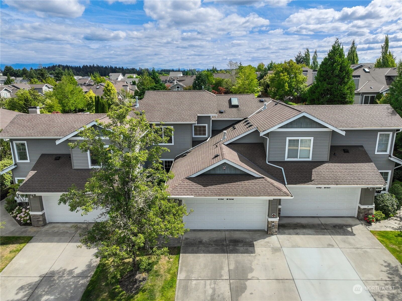 Property Photo:  1110  63rd Street SE 102  WA 98092 