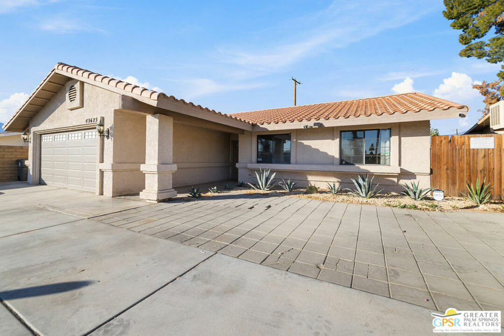 Property Photo:  43625 Portola Avenue  CA 92260 