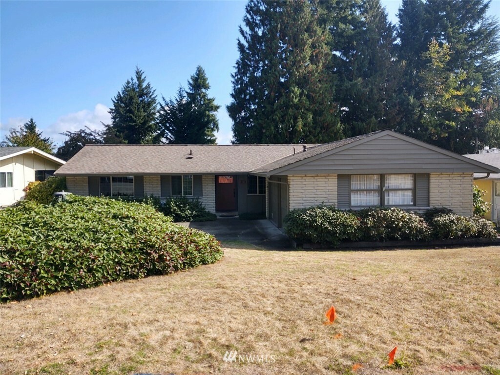 Property Photo:  810  168th Place NE  WA 98008 