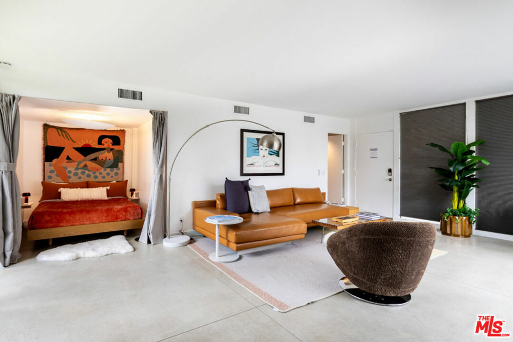 Property Photo:  130 W Racquet Club Road 306  CA 92262 