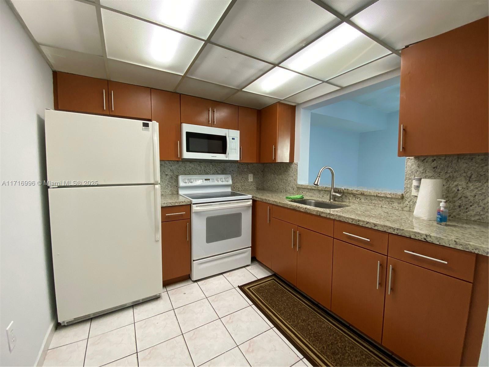 Property Photo:  2055 SW 122nd Ave 205  FL 33175 