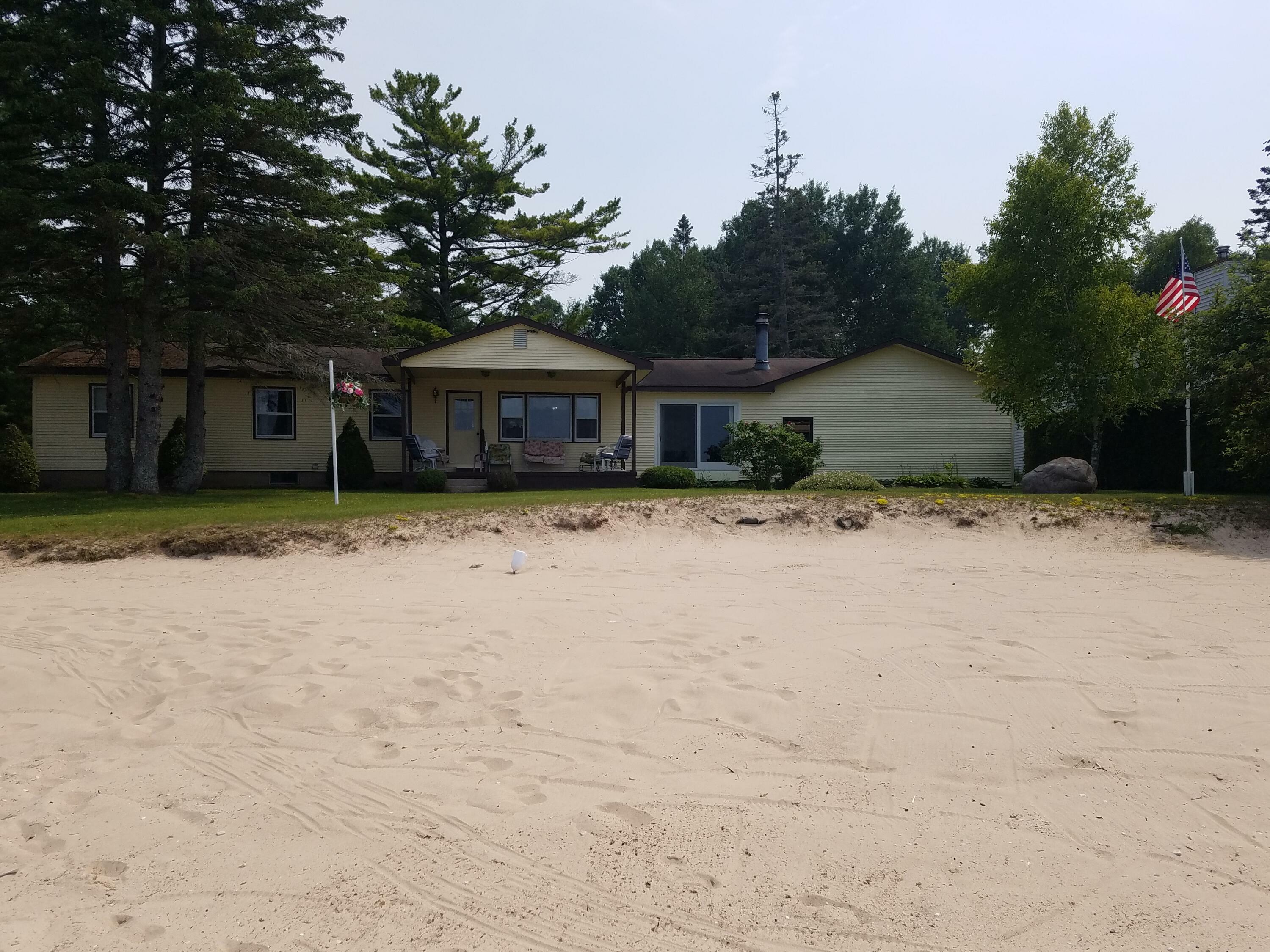 Property Photo:  1122 Shore Drive  MI 49721 