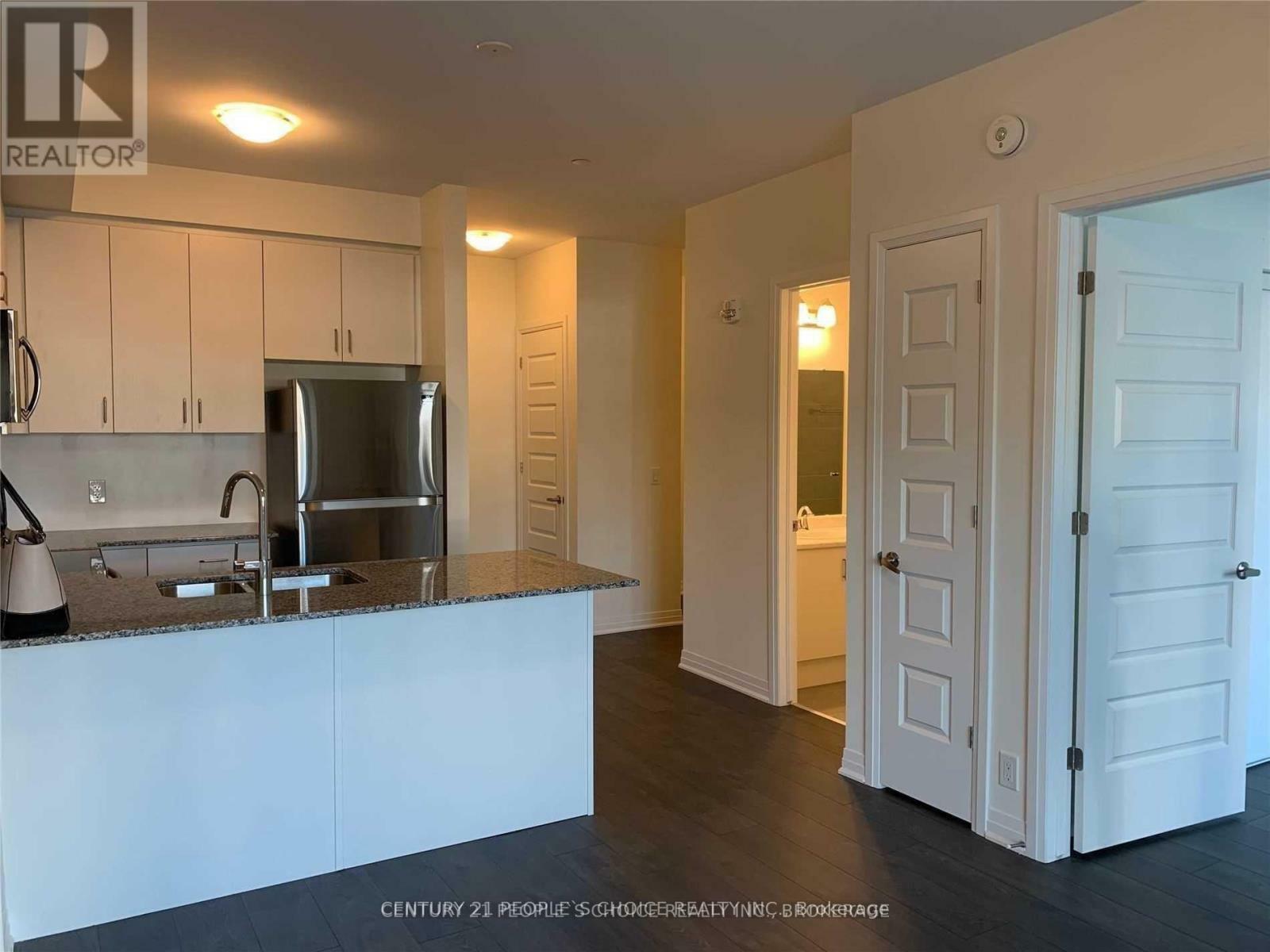 Property Photo: 128 Grovewood Common Circle 102 ON L6H 0X3