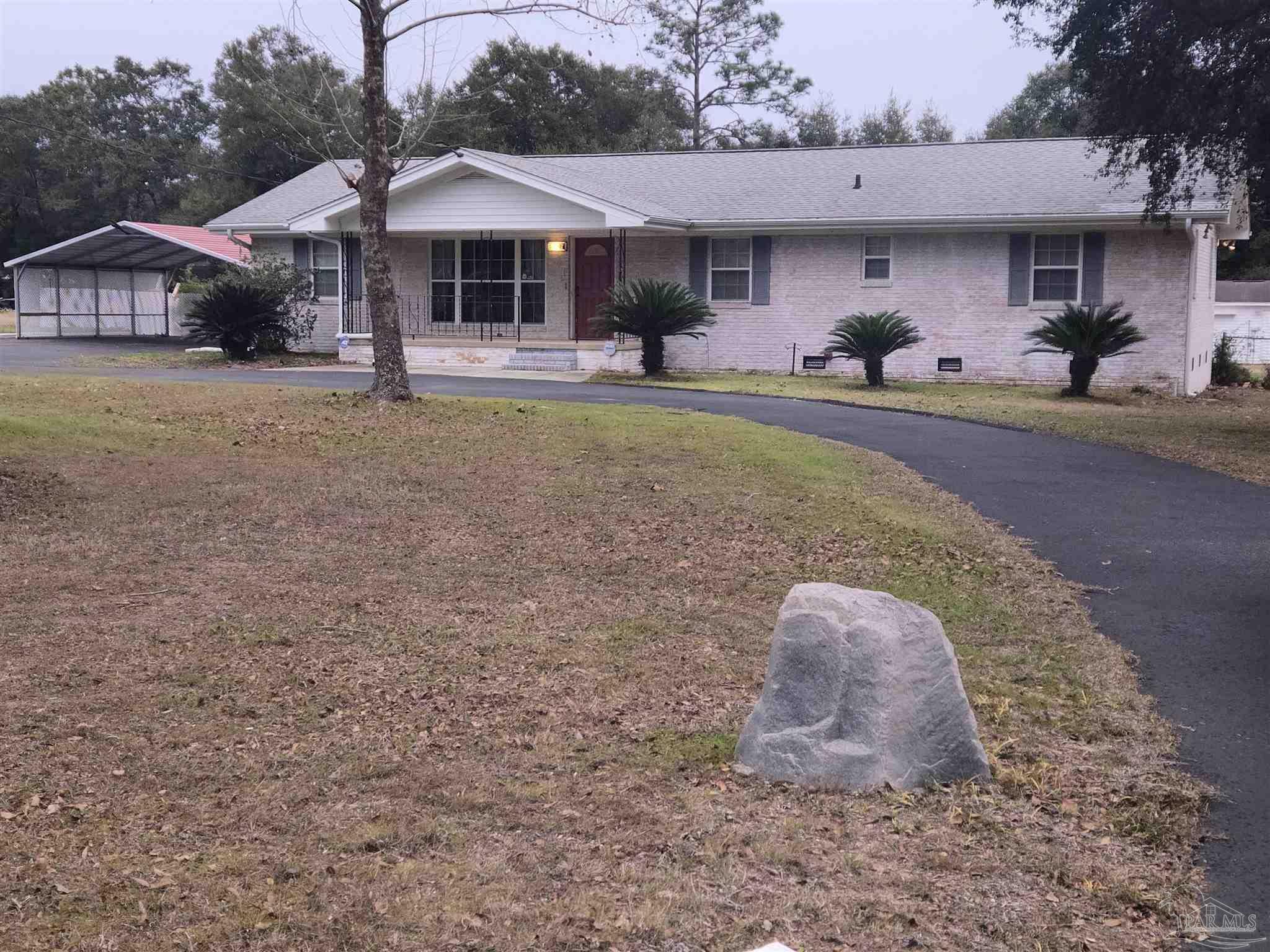 Property Photo:  5360 Swanner Rd  FL 32570 