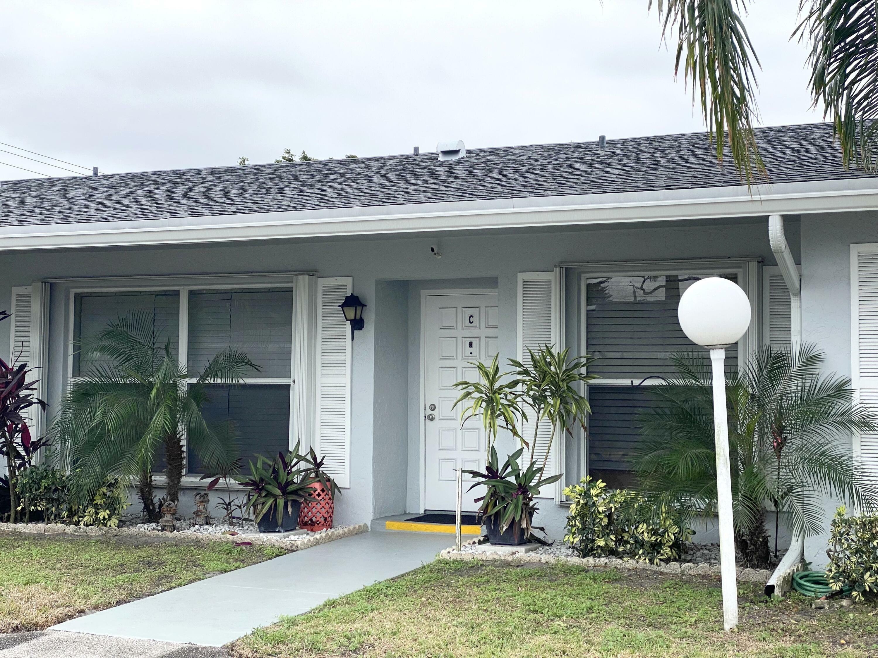 Property Photo:  1420 SW 27th Avenue C  FL 33445 