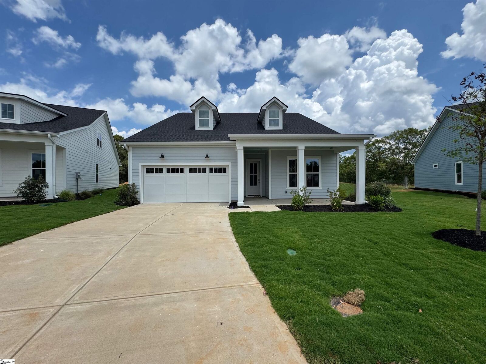 Property Photo:  118 Winding Stream Circle Lot 19 Saltcreek Elite Farmhouse  SC 29681 