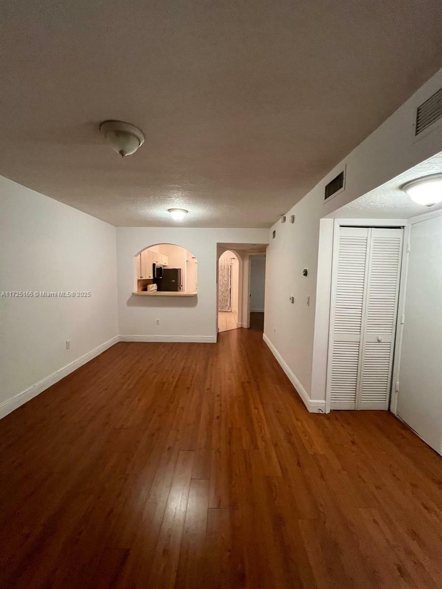 Property Photo:  945 NE 34th Ave 103  FL 33033 