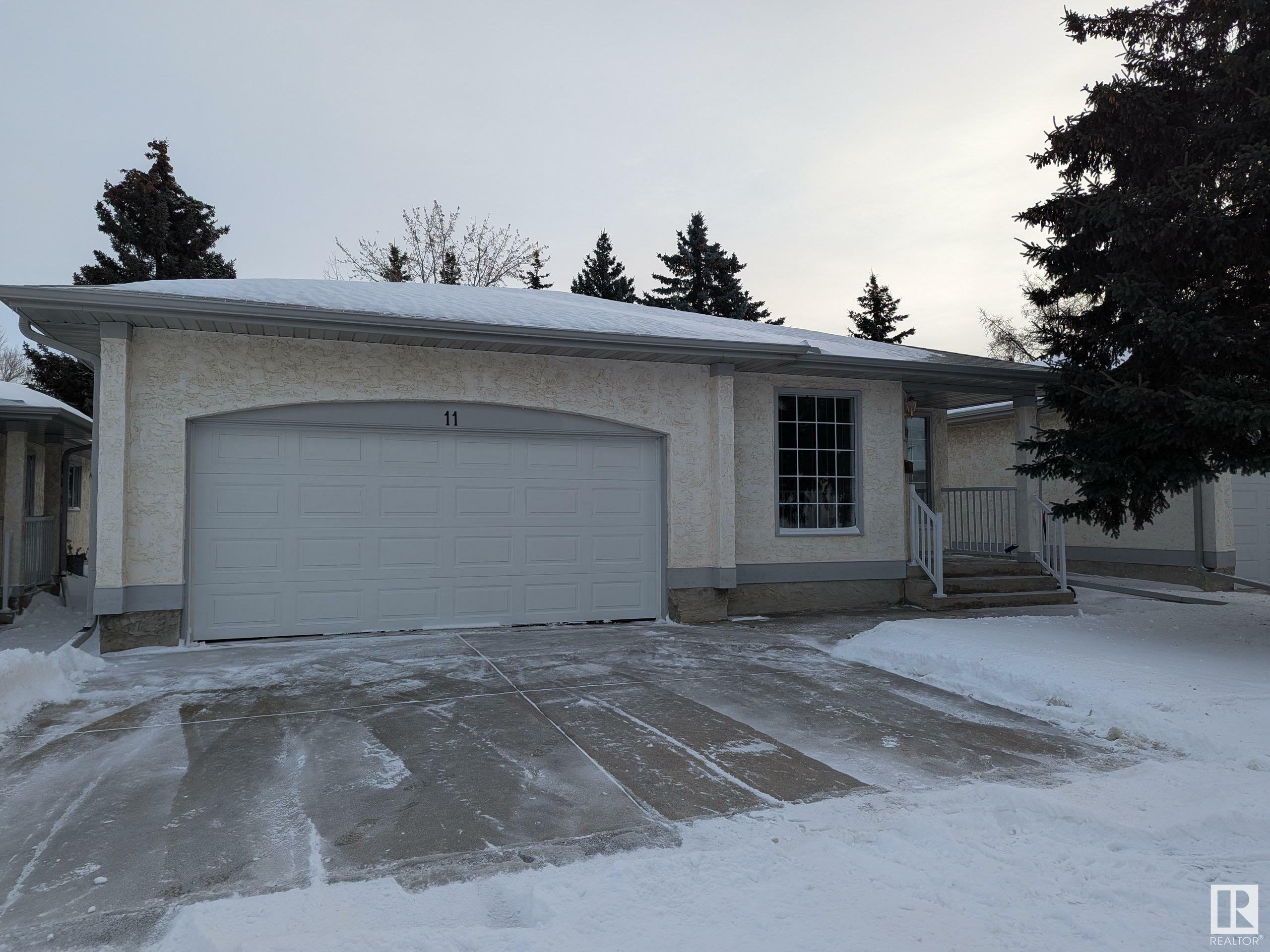 Property Photo:  9111 Grandin Road  AB T8N 5N3 