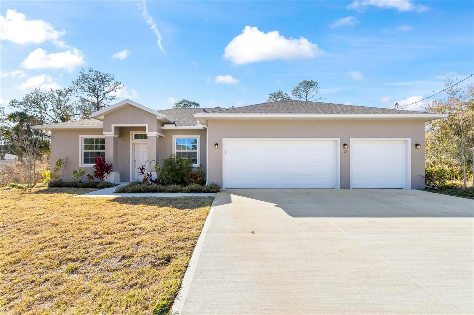 Property Photo:  63 Whispering Pine Drive  FL 32164 