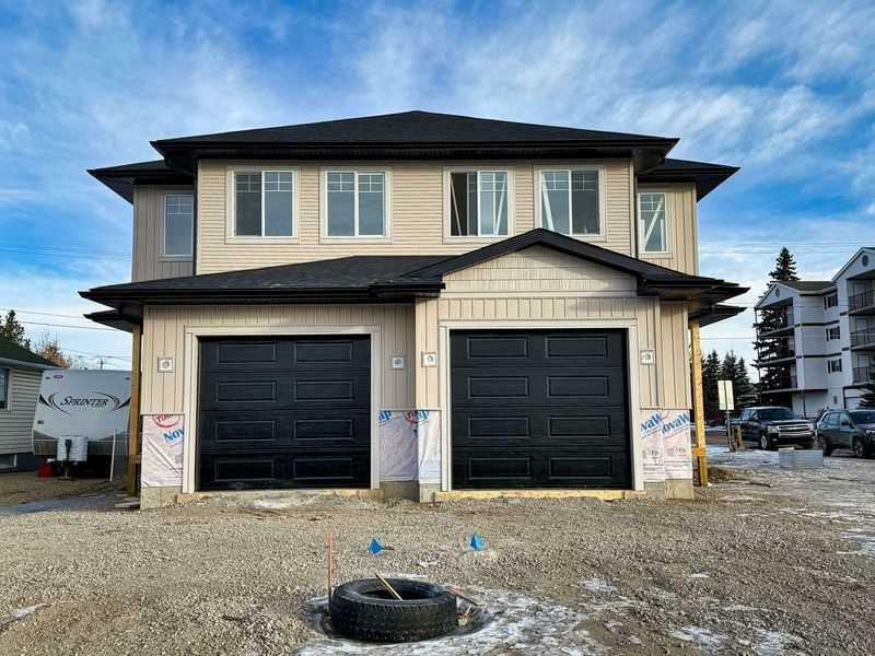 Property Photo:  5204 50 Street  AB T4H 1H2 