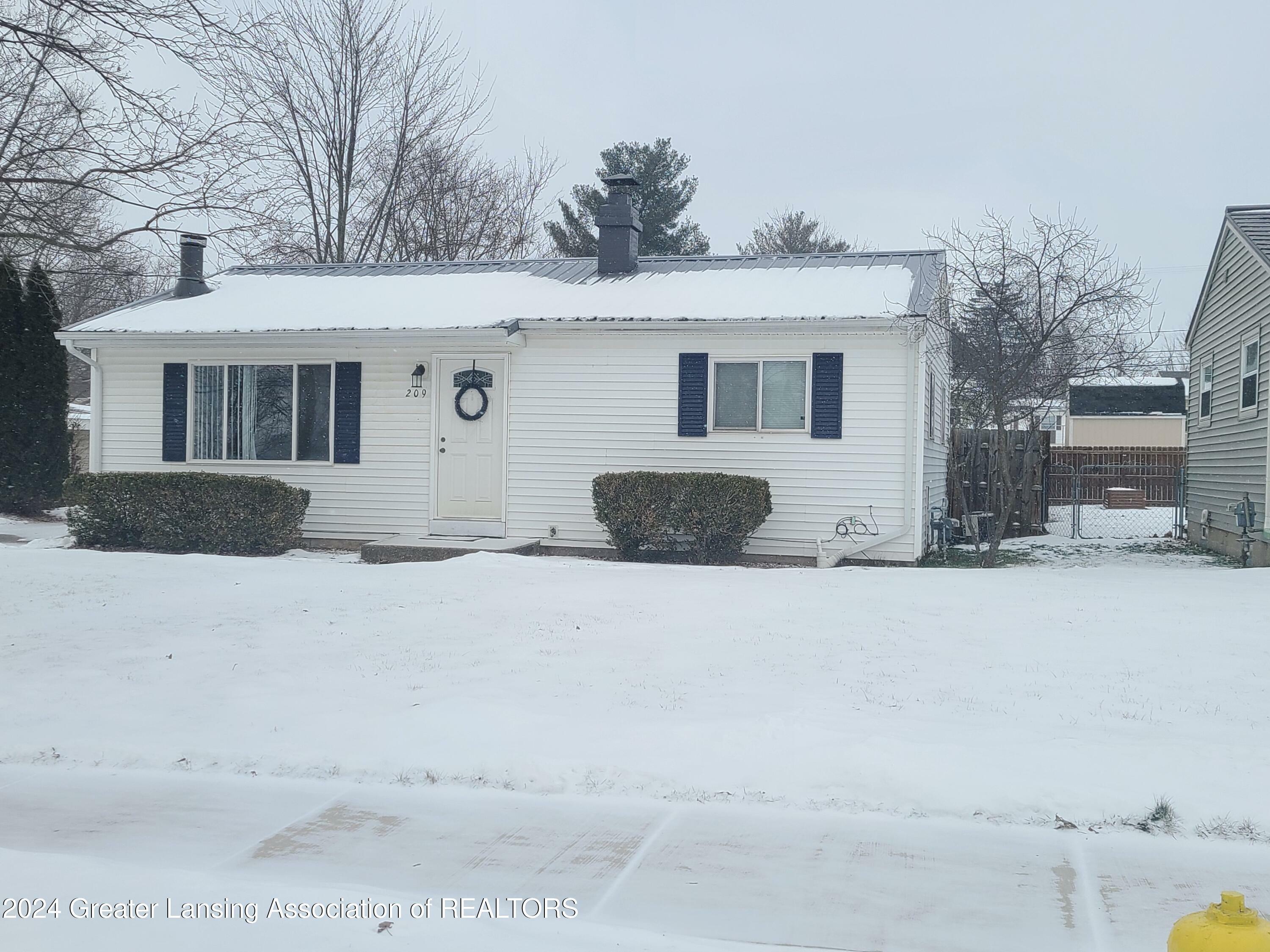 Property Photo:  209 Folk Street  MI 48876 