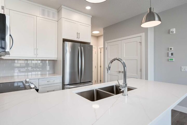Property Photo:  175 Wolf Hollow Crescent SE 210  AB X0X 0X0 