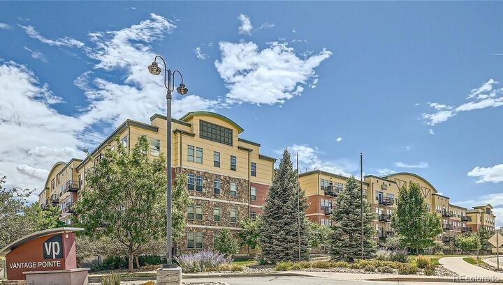 Property Photo:  13456 Via Varra 406  CO 80020 