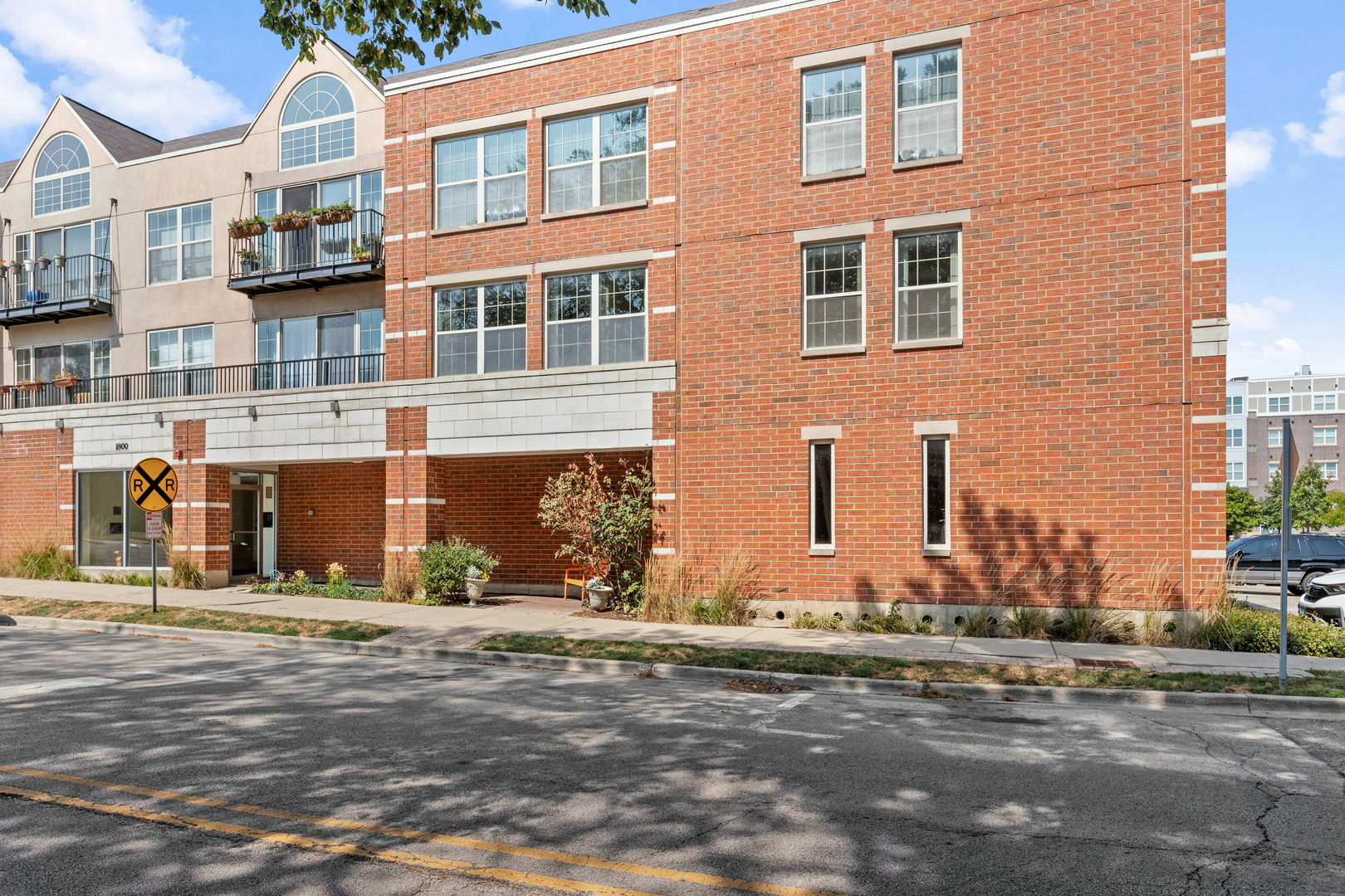 Property Photo:  1800 Dewes Street 310  IL 60025 