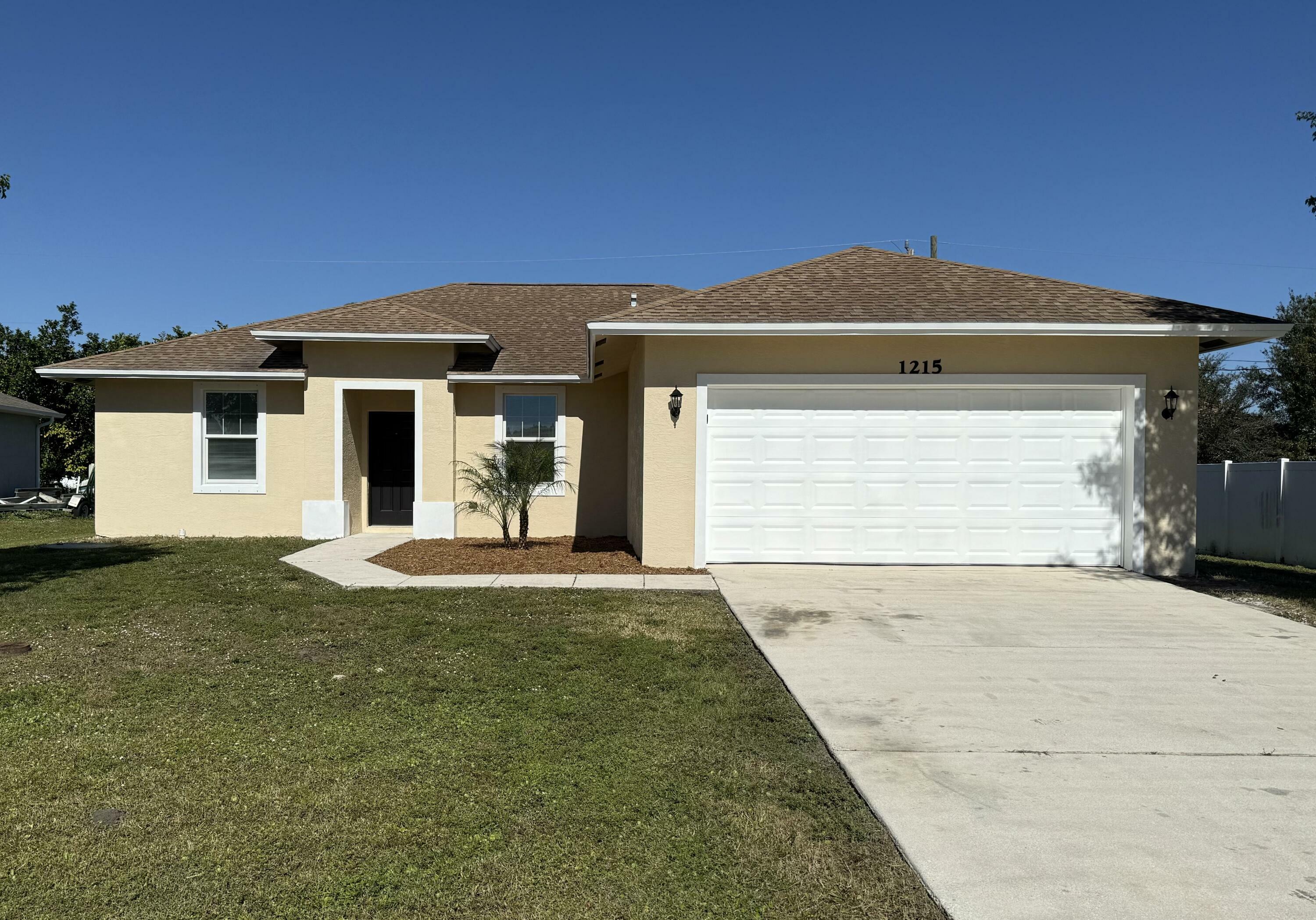 Property Photo:  1215 SW Ermine Avenue  FL 34953 