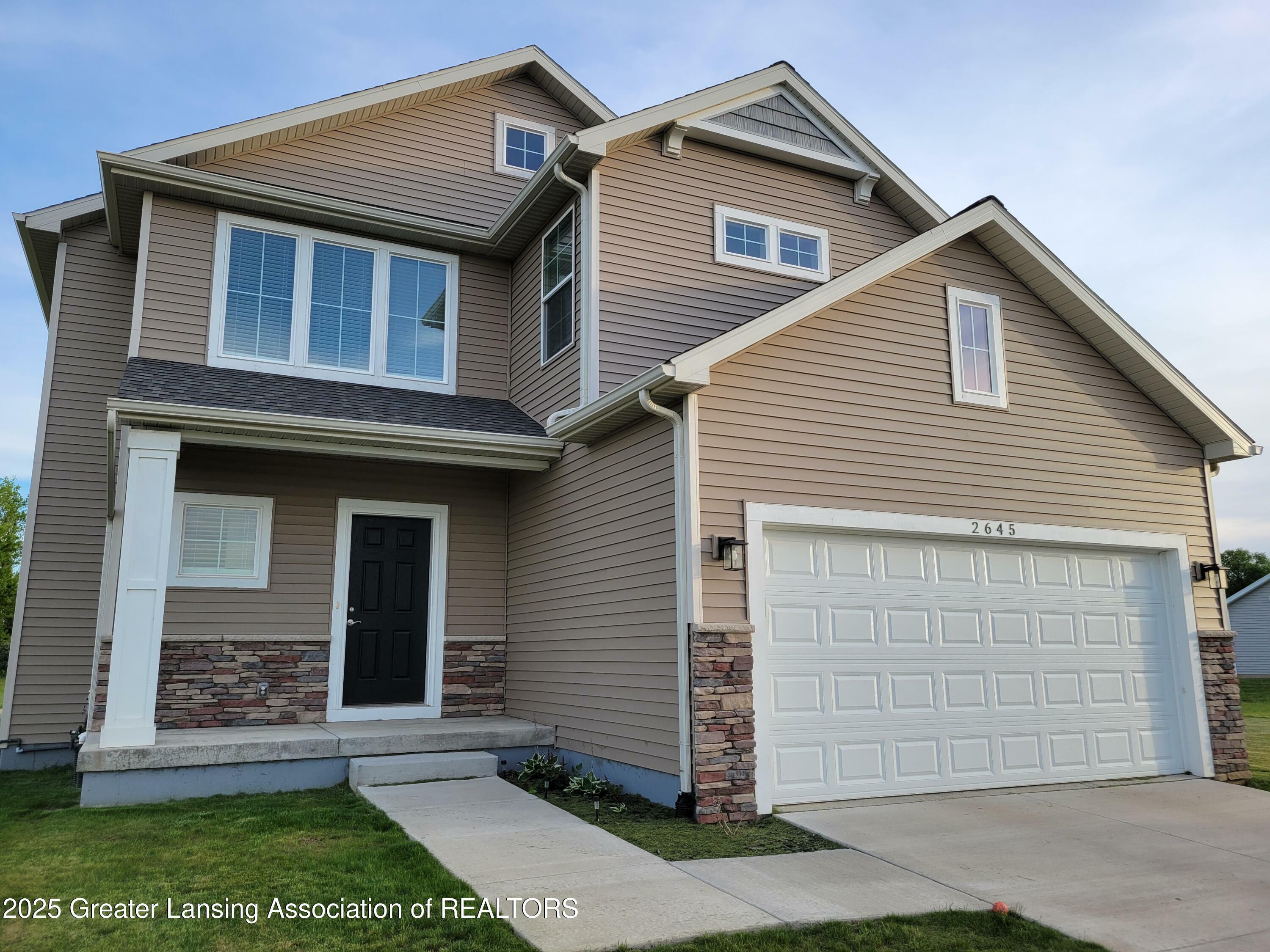 Property Photo: 2645 Boulder Creek Drive MI 48879