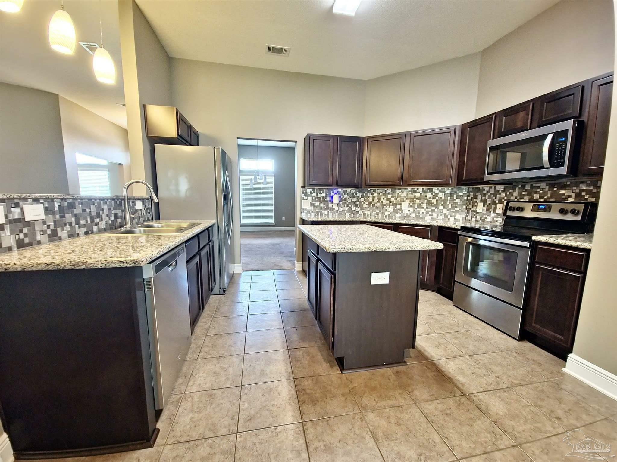 Property Photo: 7069 Harvest Way FL 32570