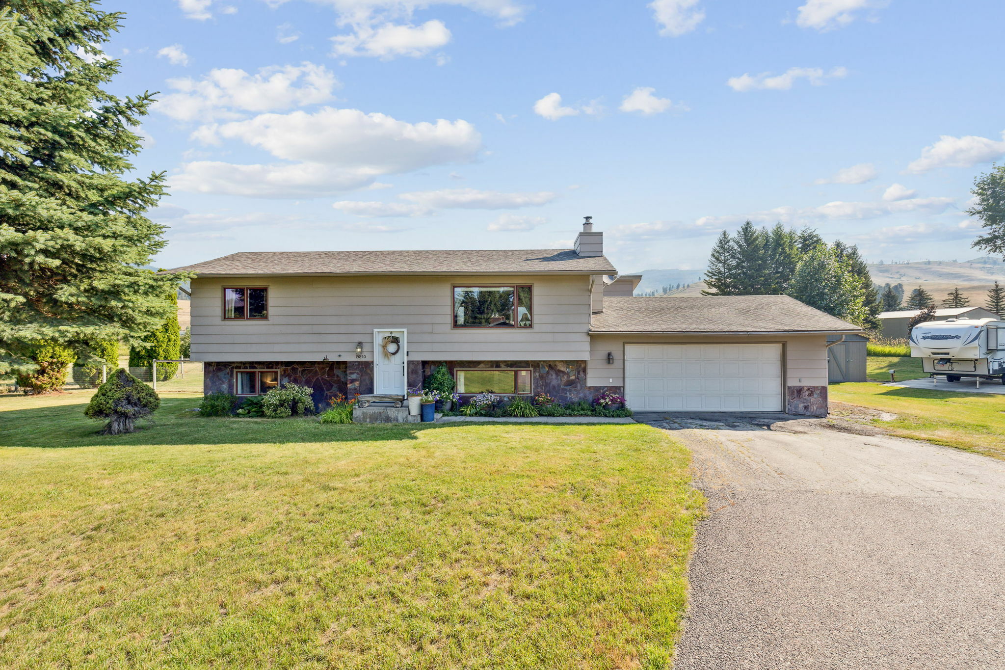 Property Photo:  15850 Mullan Road  MT 59808 