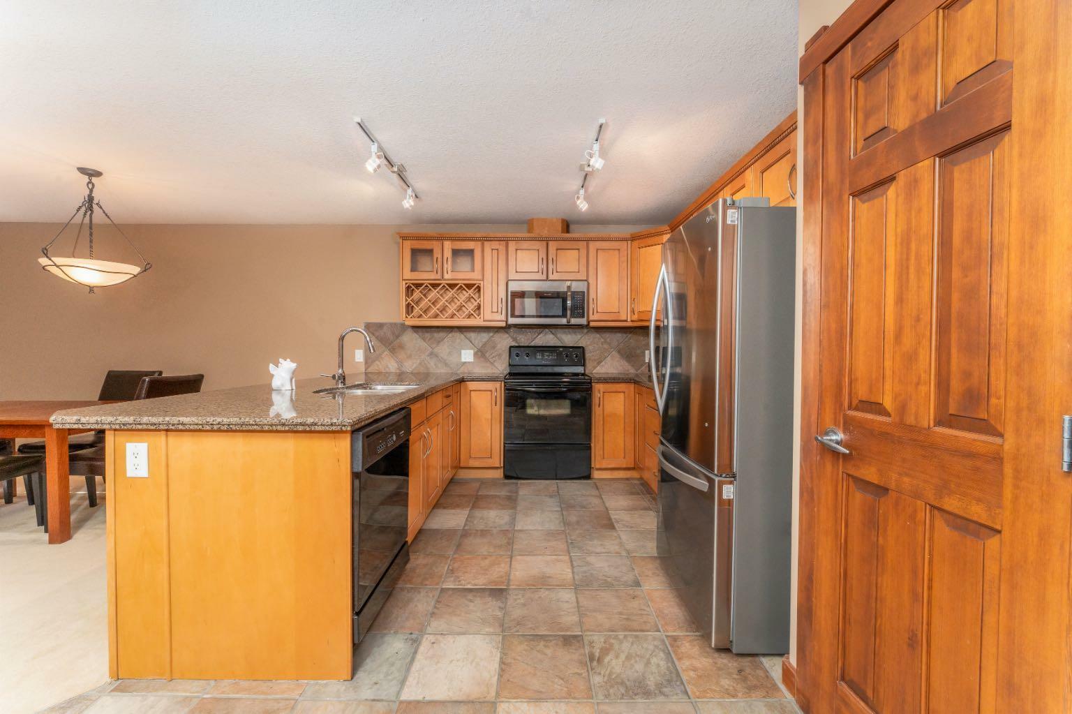 Property Photo:  170 Crossbow Place 309  AB T1W 3H4 