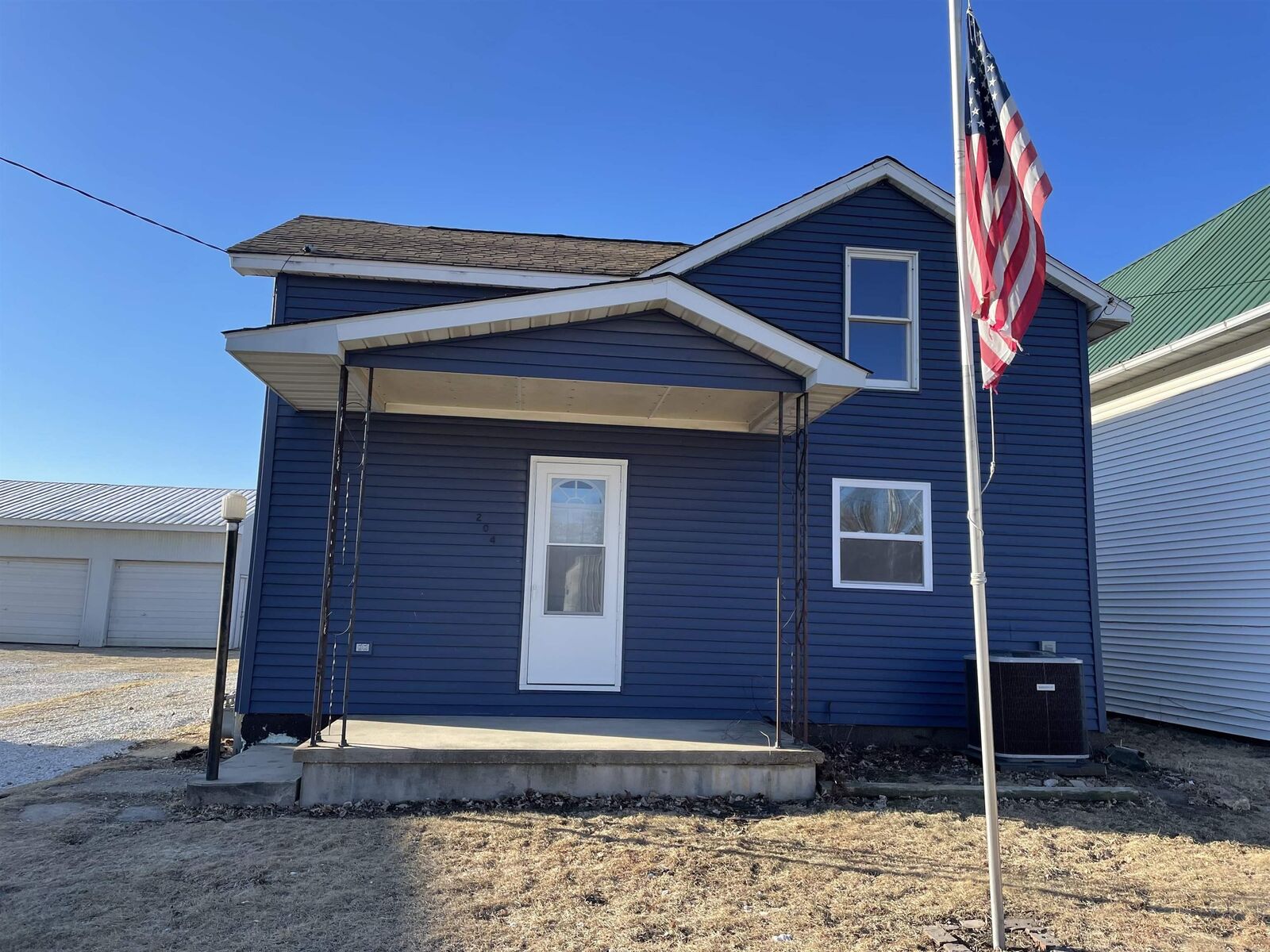 Property Photo:  204 E Mission Street  IA 52076 