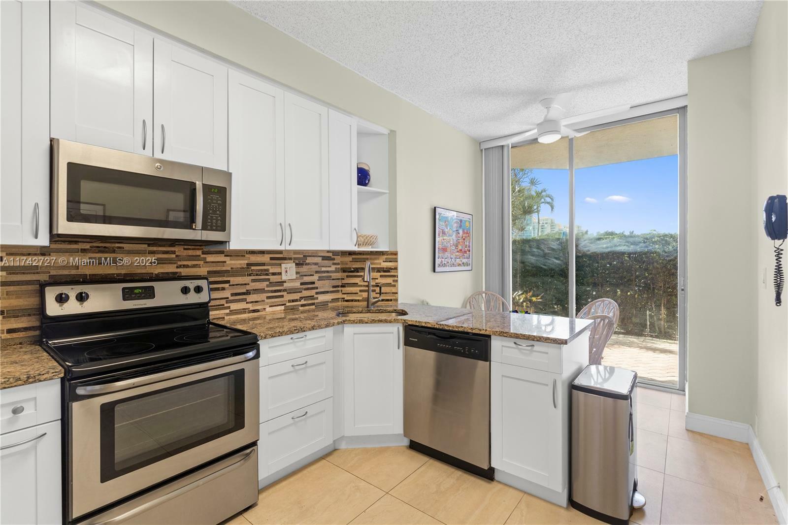 Property Photo: 3530 Mystic Pointe Dr 102 FL 33180