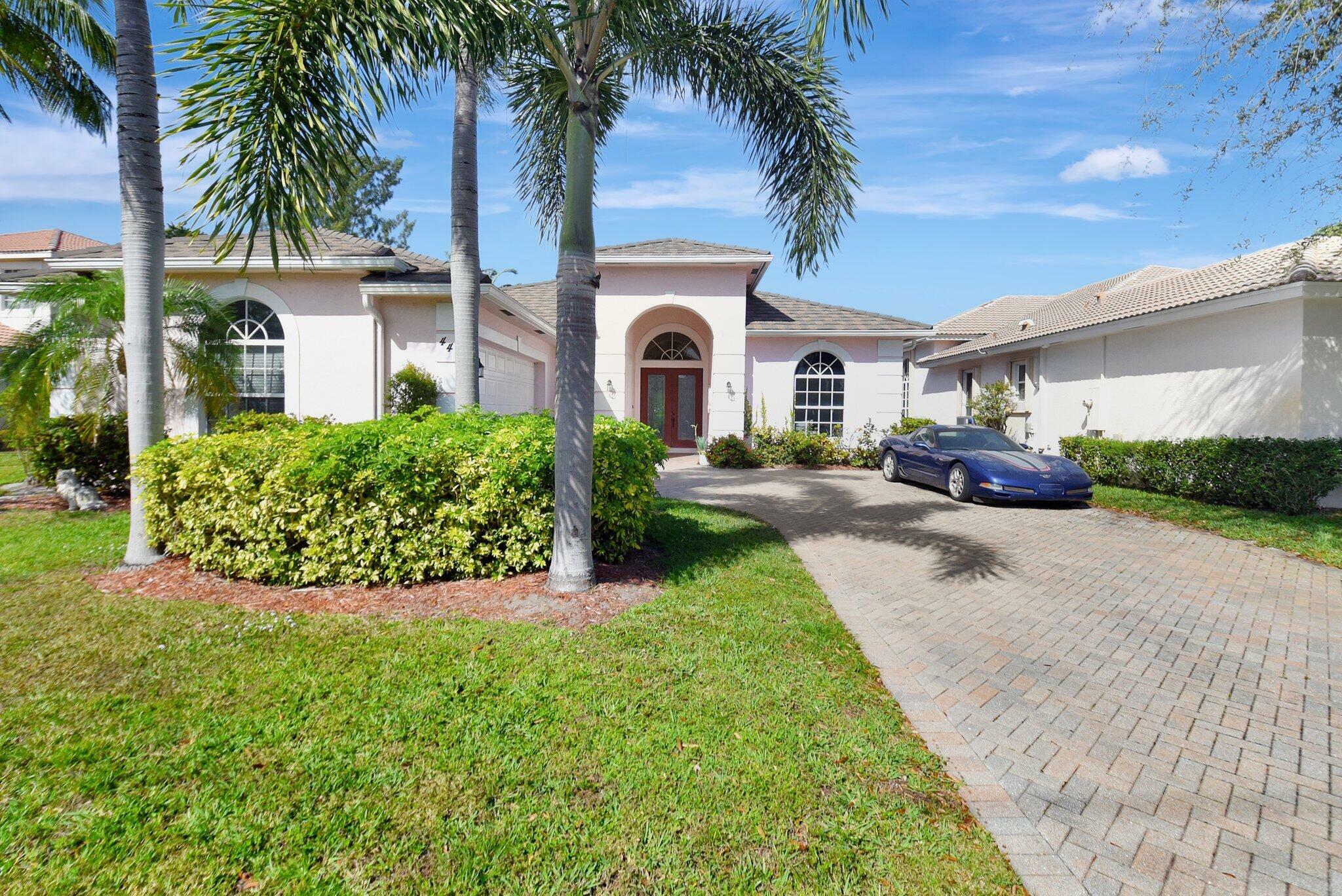 Property Photo:  447 Pine Tree Court S  FL 33462 