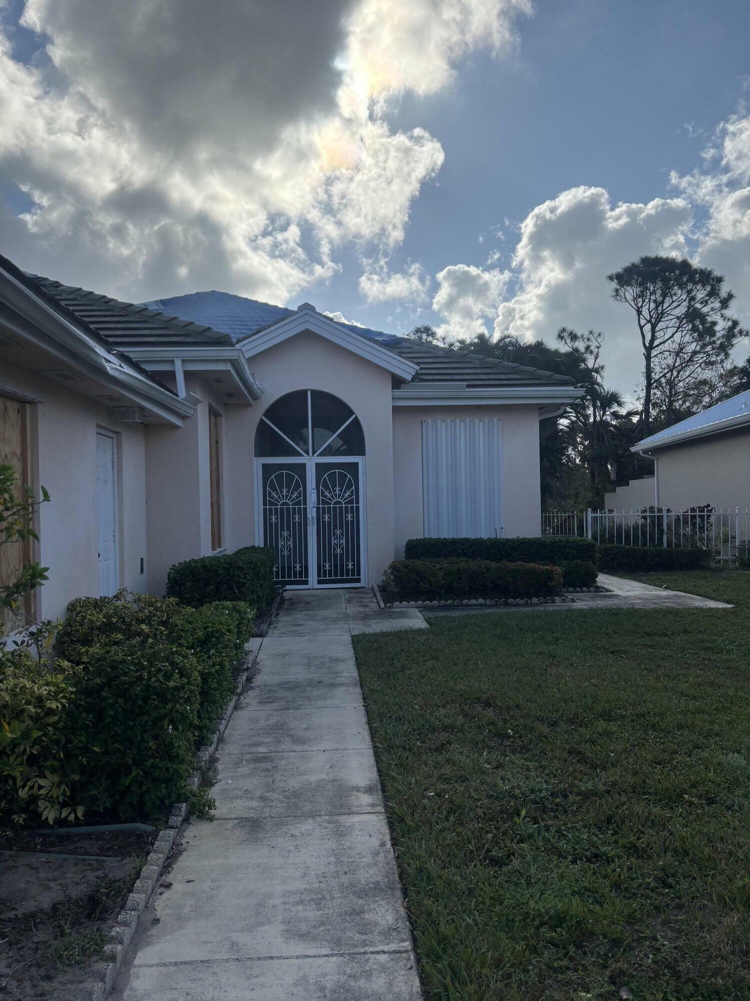 Property Photo:  7751 SE Bay Cedar Circle  FL 33455 