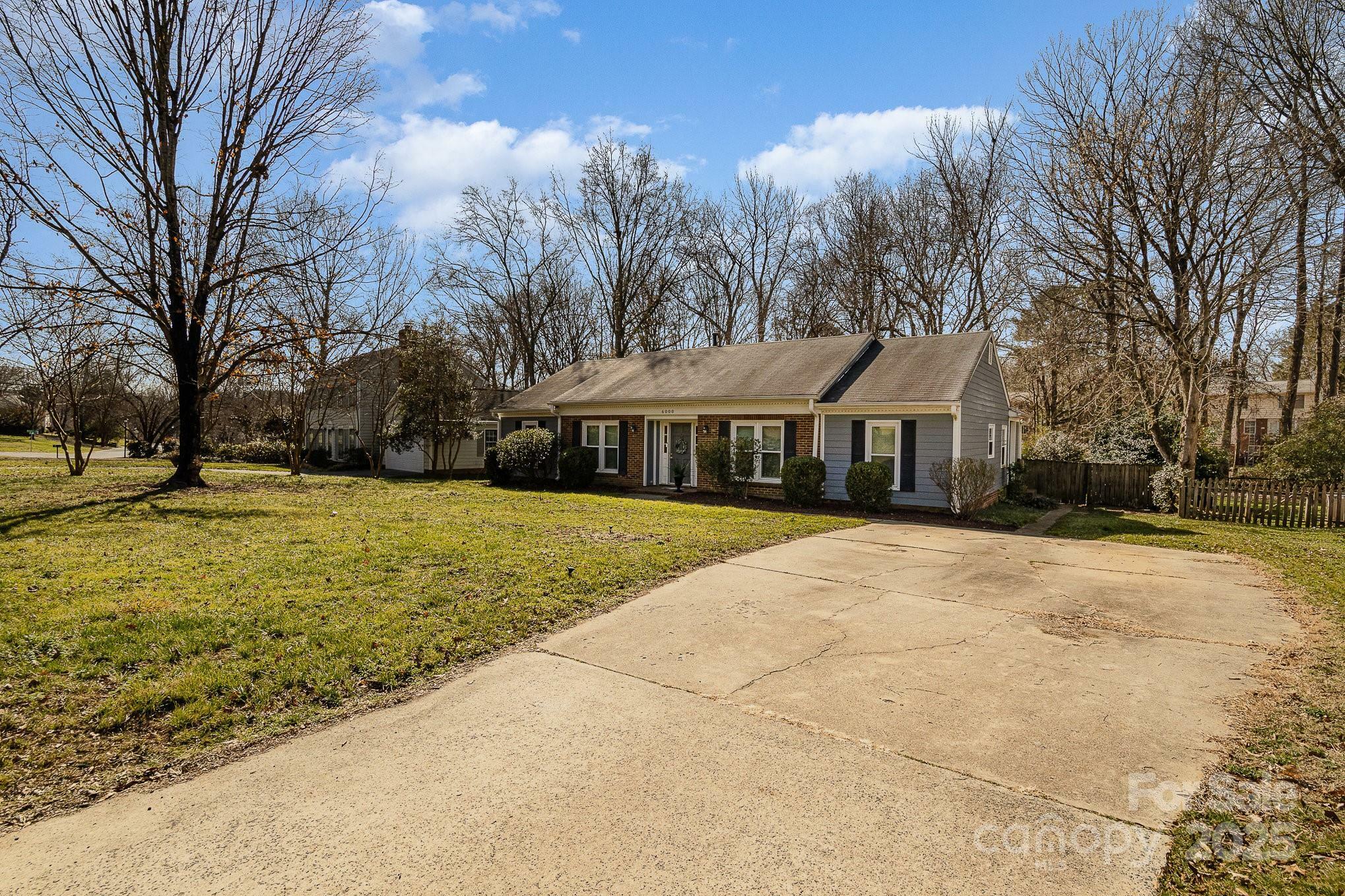 Property Photo:  6000 Carmel Station Avenue  NC 28226 