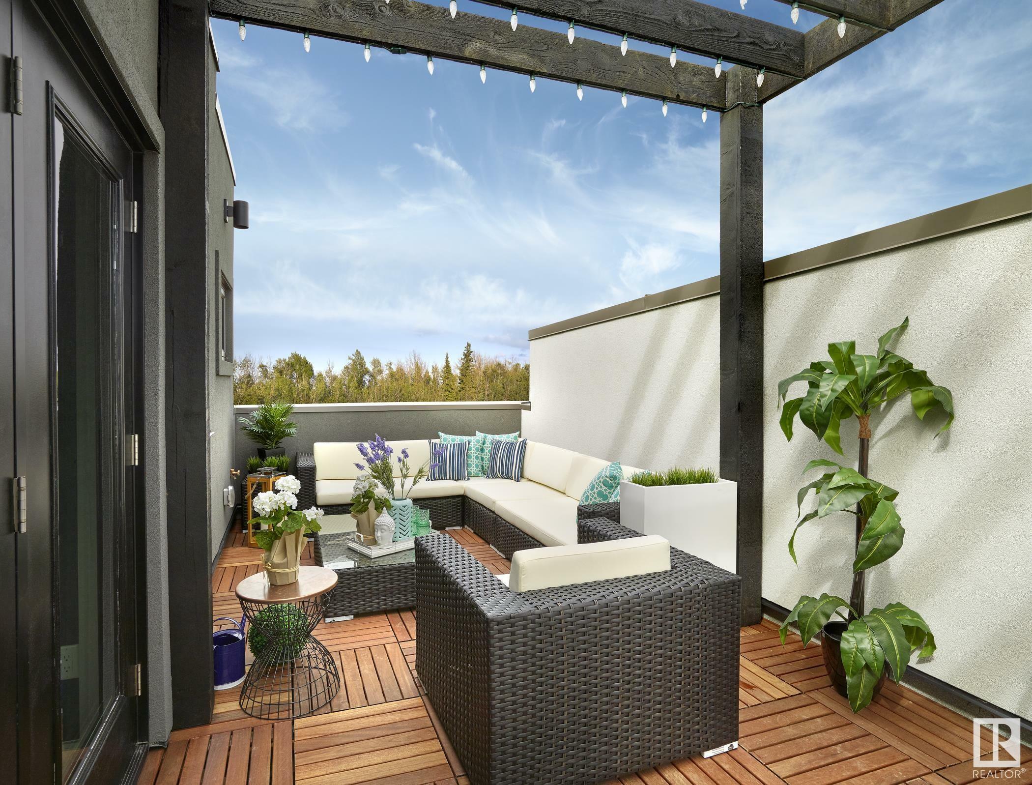 Property Photo: 1304 Rutherford Road SW 2 AB T6W 3W3