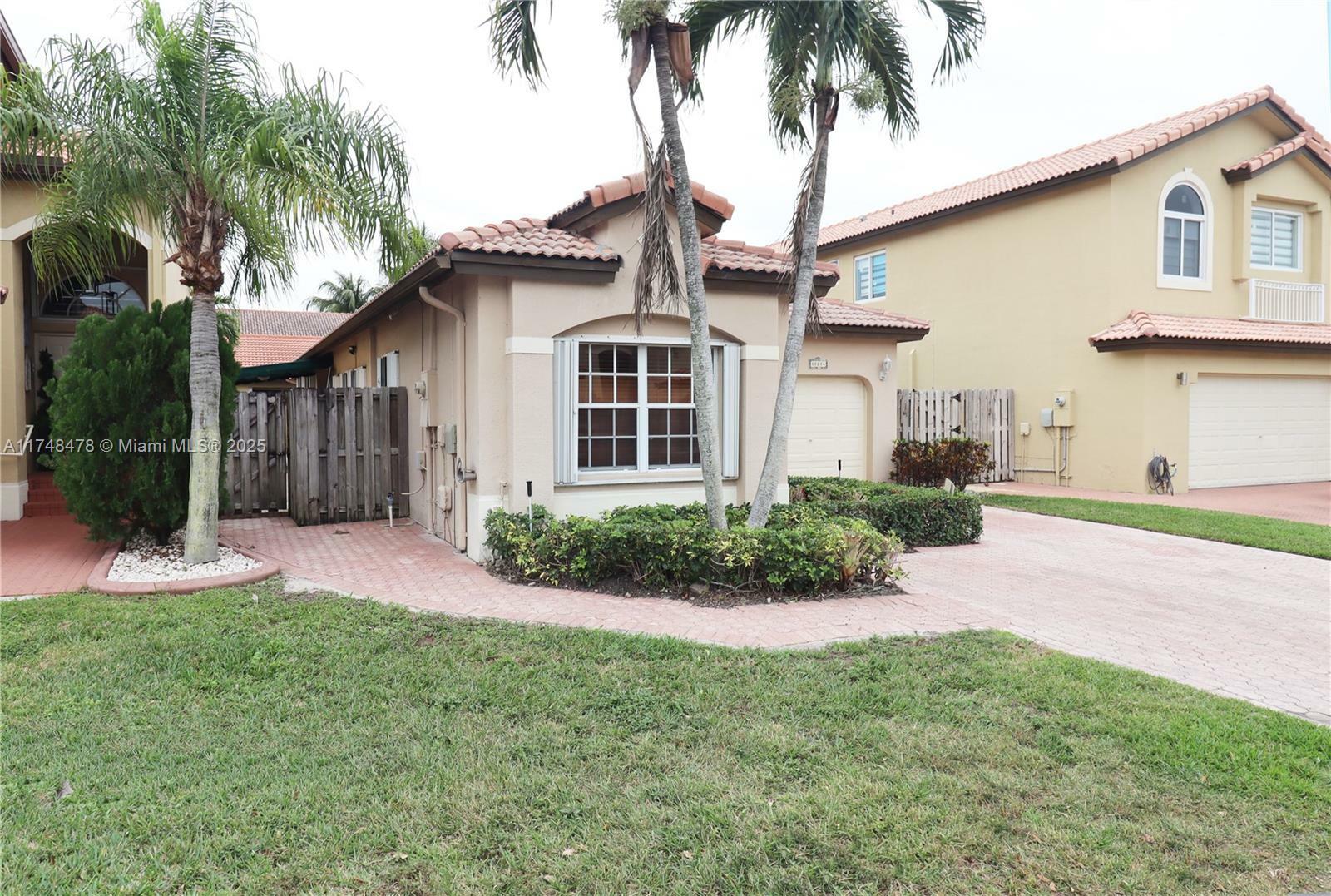 Property Photo:  11214 NW 53rd Ln -  FL 33178 