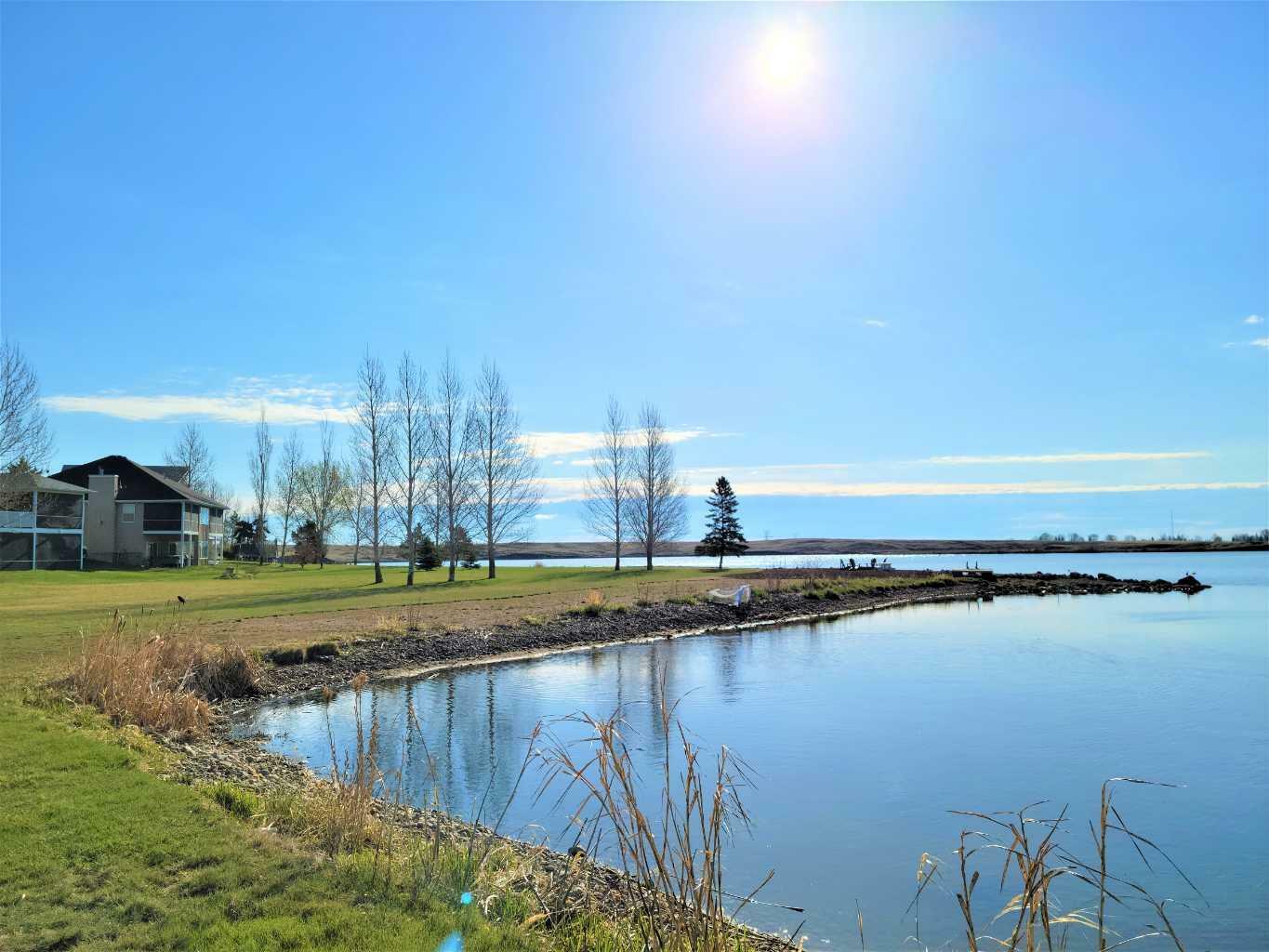 Property Photo: 27 Blue Heron Bay AB T1R 0X5