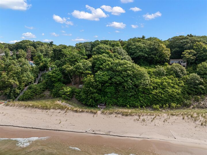 Property Photo:  5959 Lake Harbor Road North And Middle Cottages  MI 49441 