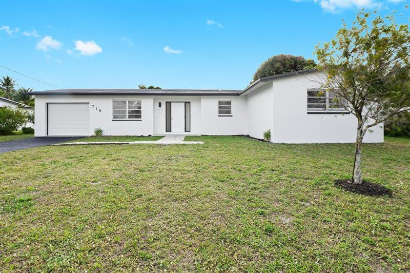 Property Photo:  718 NW 48th Ter  FL 33317 