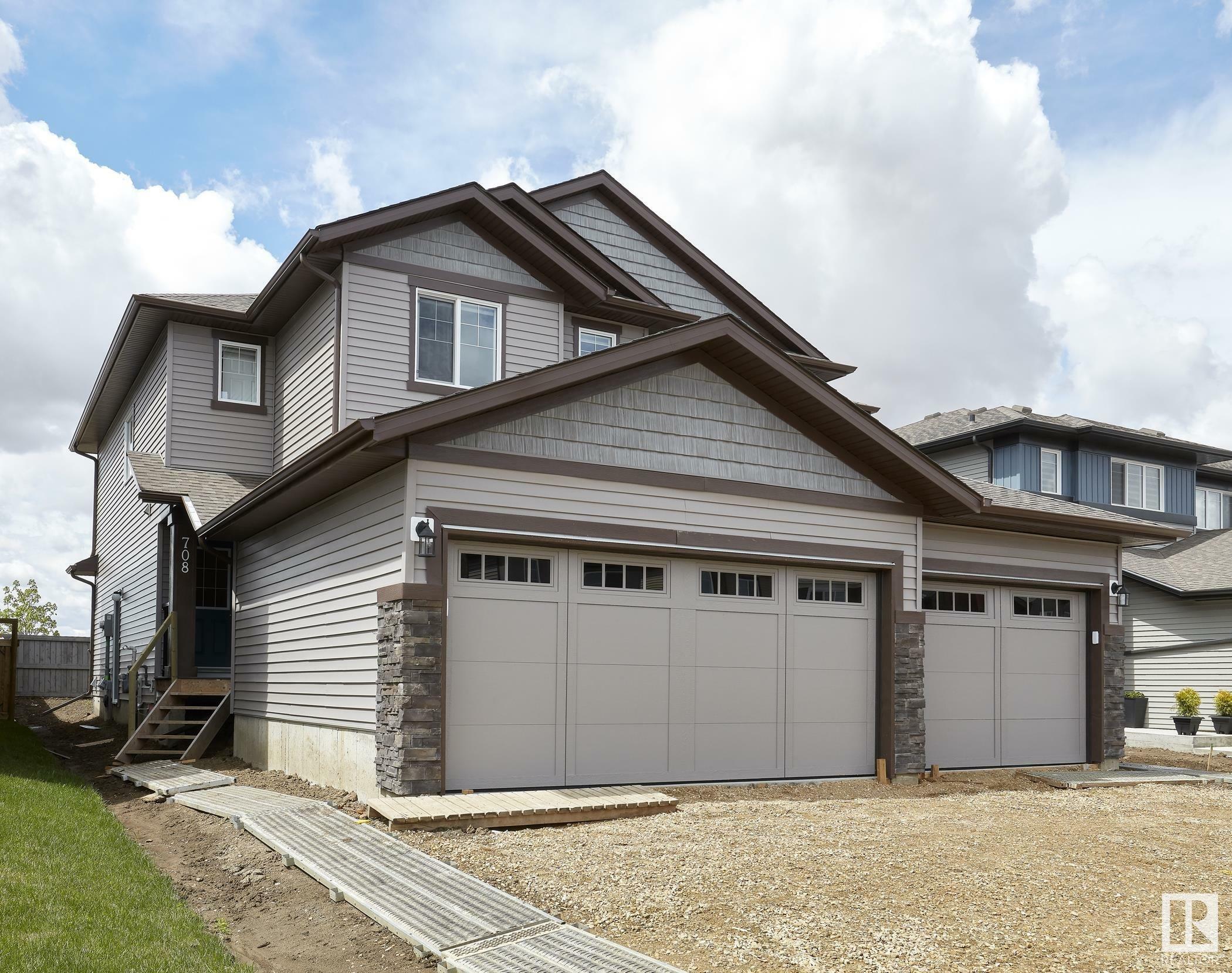 Property Photo:  708 Berg Loop  AB T9E 1G7 