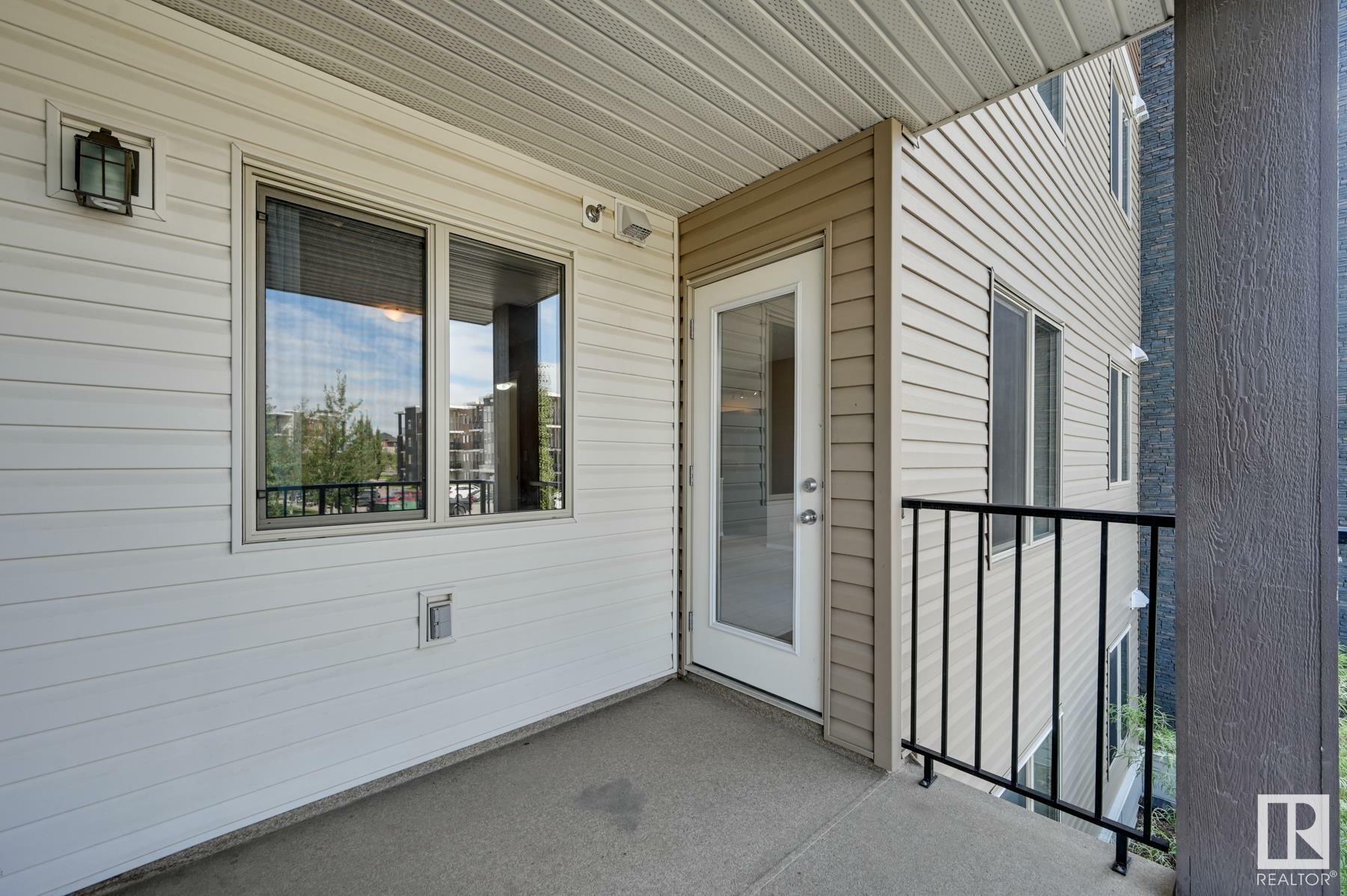 Property Photo:  11804 22 Avenue SW 207  AB T6W 2A2 