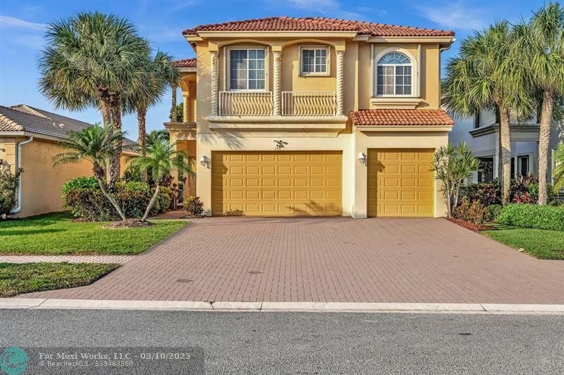 Property Photo: 136 Catania Way FL 33411