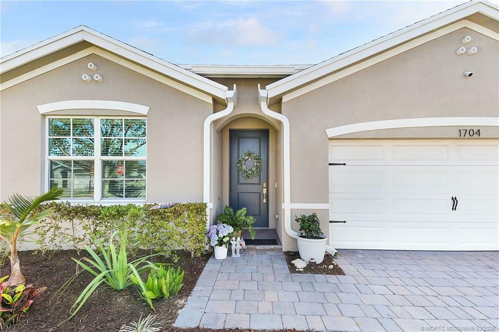 Property Photo:  1704 NE White Pine Terrace  FL 34957 