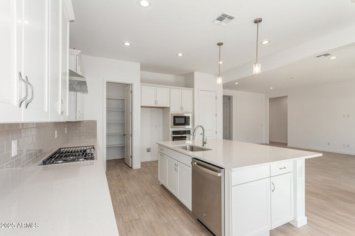 Property Photo: 24134 N 172nd Avenue AZ 85387