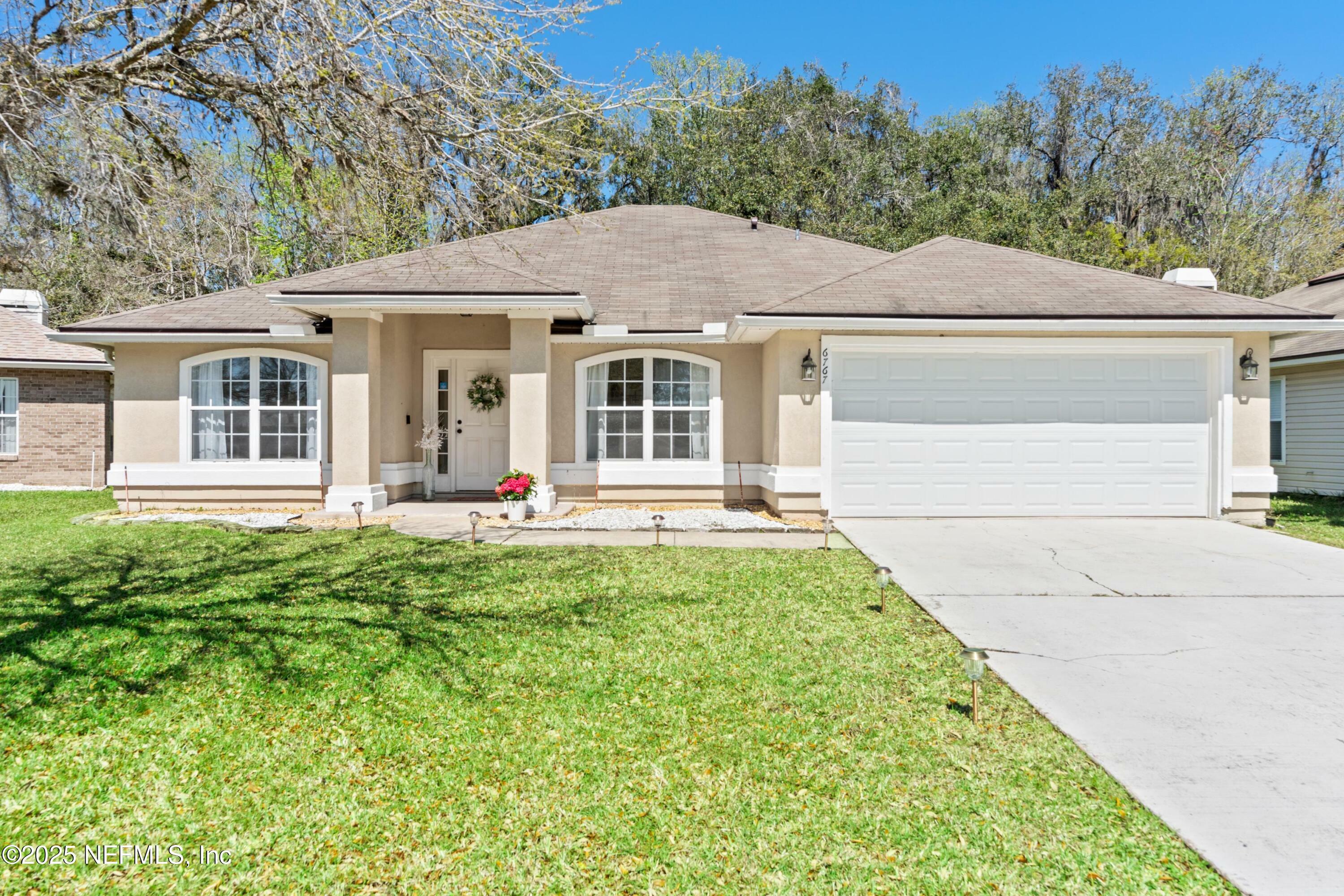 Property Photo:  6767 Royal Leaf Lane  FL 32244 