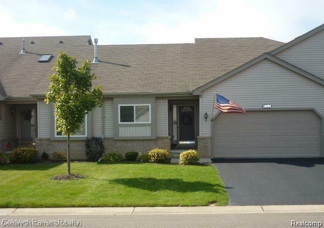 Property Photo: 35008 Mitchell Street 209 MI 48439