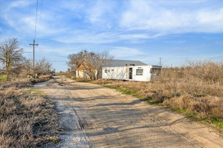 Property Photo: 4975 E Highway 71 Highway E TX 78617